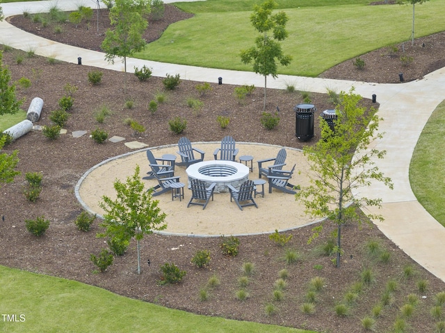 view of patio with a fire pit