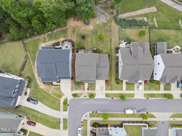 aerial view of property's location with nearby suburban area