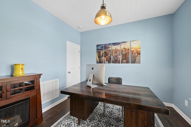 office space featuring dark wood finished floors and baseboards