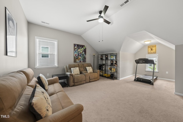 living area with lofted ceiling, light carpet, baseboards, and ceiling fan