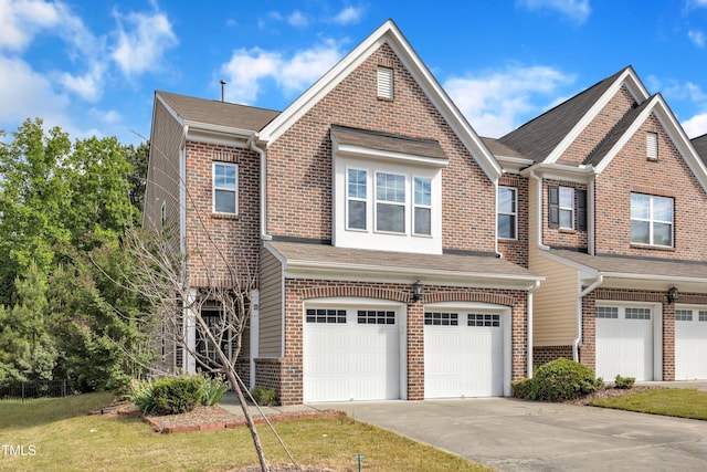 416 Durants Neck Ln, Morrisville, NC 27560 - view of property featuring brick siding, an attached garage, concrete driveway, and roof with shingles