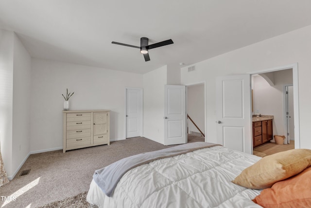 416 Durants Neck Ln, Morrisville, NC 27560 - bedroom with light carpet, baseboards, arched walkways, a ceiling fan, and ensuite bathroom