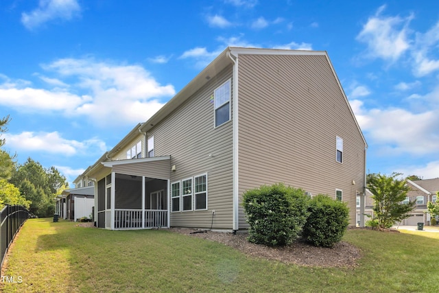 416 Durants Neck Ln, Morrisville, NC 27560 - rear view of property with a sunroom