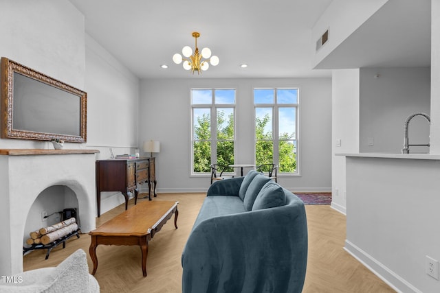 320 W Martin St Unit 205, Raleigh, NC 27601 - living room with baseboards, recessed lighting, and a chandelier