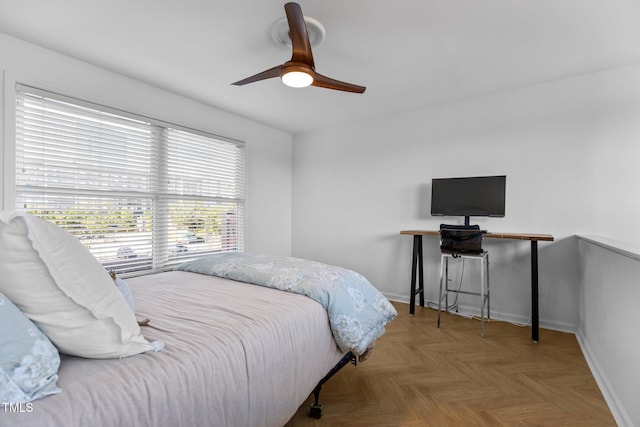 320 W Martin St Unit 205, Raleigh, NC 27601 - bedroom with baseboards and ceiling fan