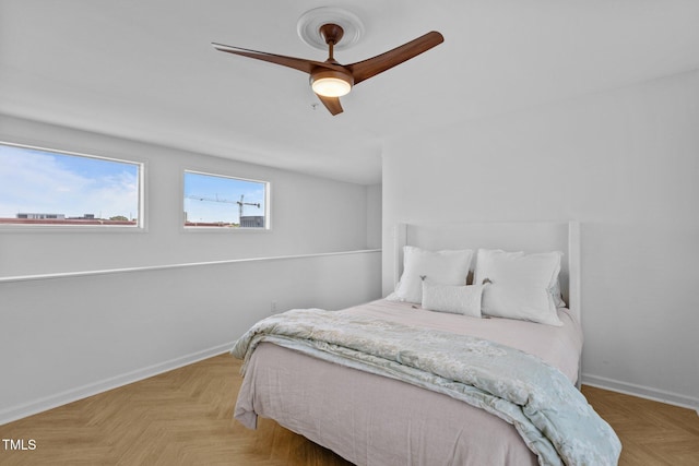 320 W Martin St Unit 205, Raleigh, NC 27601 - bedroom with baseboards and ceiling fan