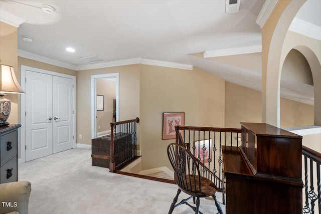 hallway featuring an upstairs landing, ornamental molding, carpet, baseboards, and recessed lighting