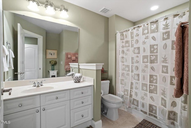 full bathroom with toilet, vanity, tile patterned floors, and a shower with curtain