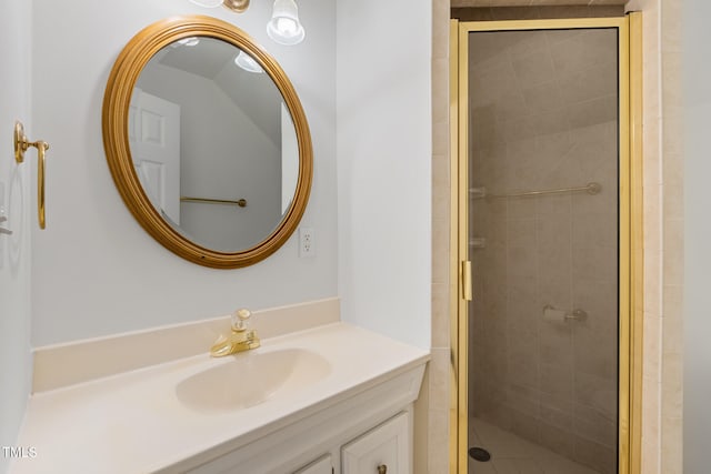 full bathroom with a stall shower and vanity