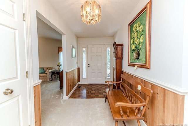 241 Firetree Ln, West End, NC 27376 - foyer featuring a chandelier and wainscoting