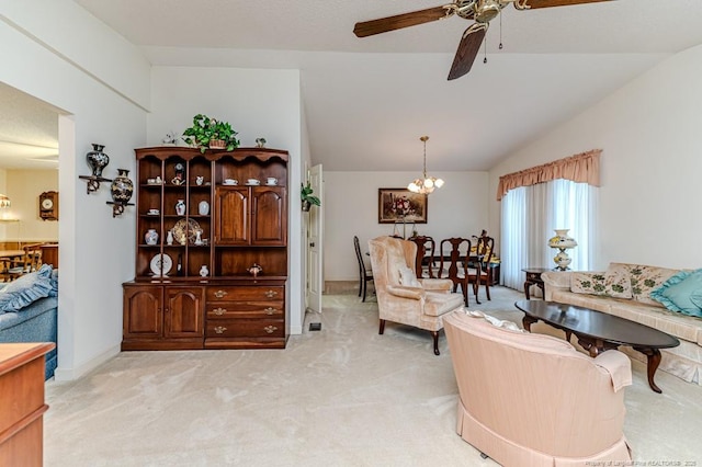 241 Firetree Ln, West End, NC 27376 - living area featuring light carpet, ceiling fan with notable chandelier, and vaulted ceiling