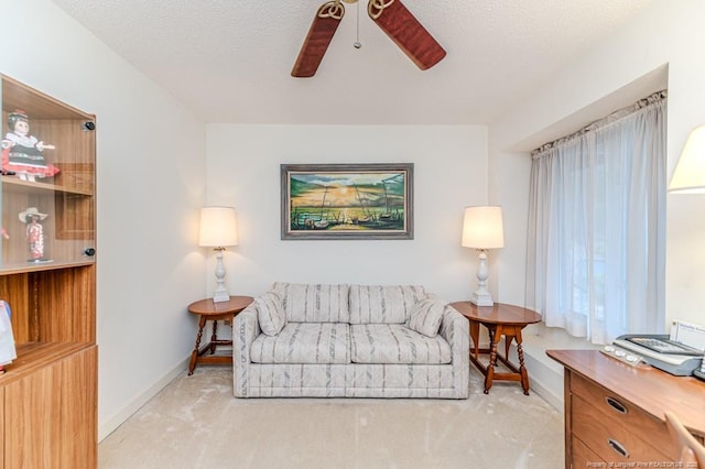 241 Firetree Ln, West End, NC 27376 - living room with a ceiling fan, light carpet, and baseboards