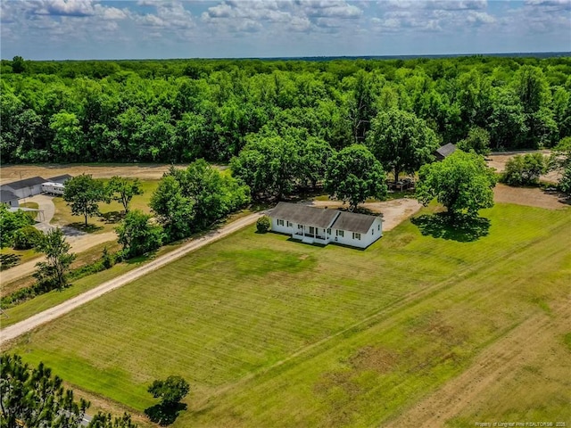 bird's eye view with a rural view and a view of trees