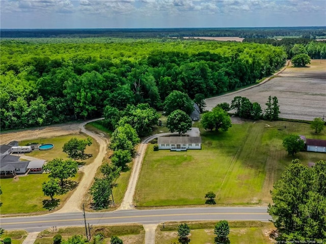 aerial view featuring a view of trees