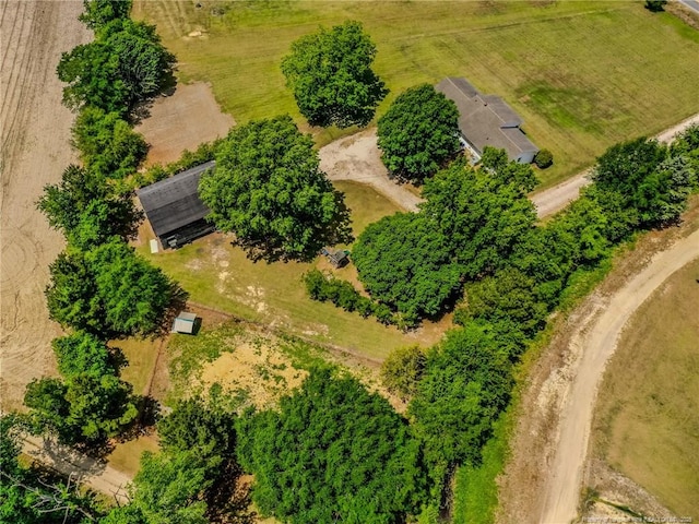 birds eye view of property with a rural view
