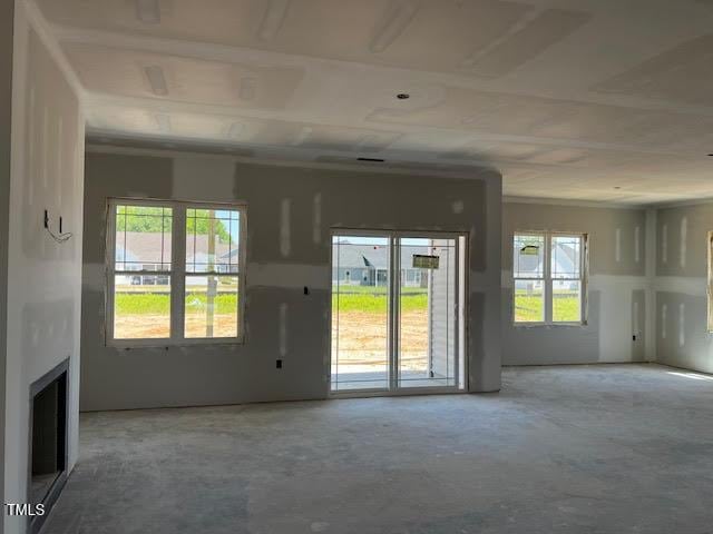 unfurnished living room with a fireplace