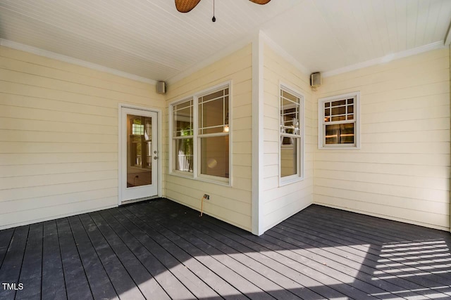 wooden deck with ceiling fan