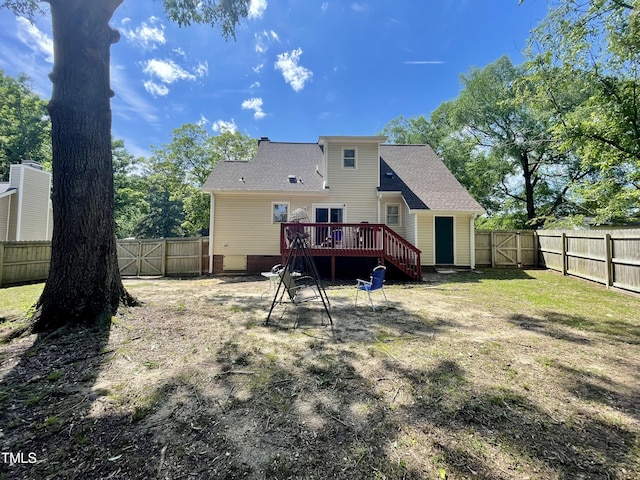 1305 Shakentown St, Knightdale, NC 27545 - rear view of house with a gate, a deck, and a fenced backyard