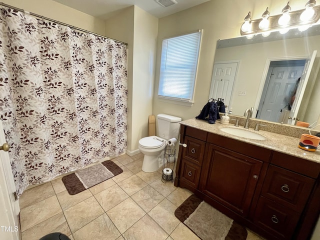 1305 Shakentown St, Knightdale, NC 27545 - bathroom featuring toilet, vanity, tile patterned flooring, and curtained shower
