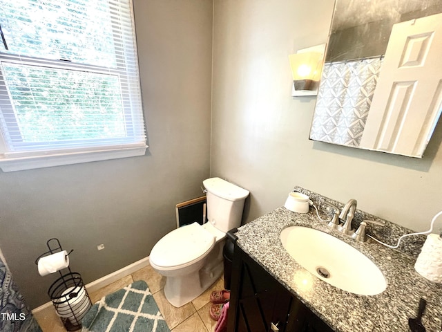 1305 Shakentown St, Knightdale, NC 27545 - bathroom featuring toilet, tile patterned flooring, vanity, and curtained shower