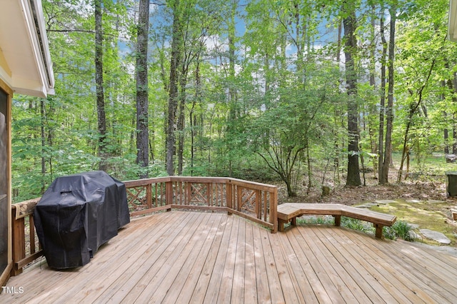 deck featuring a grill