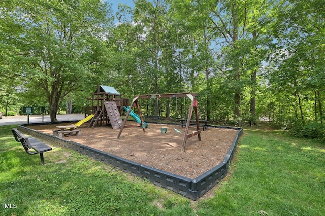 community playground featuring a yard