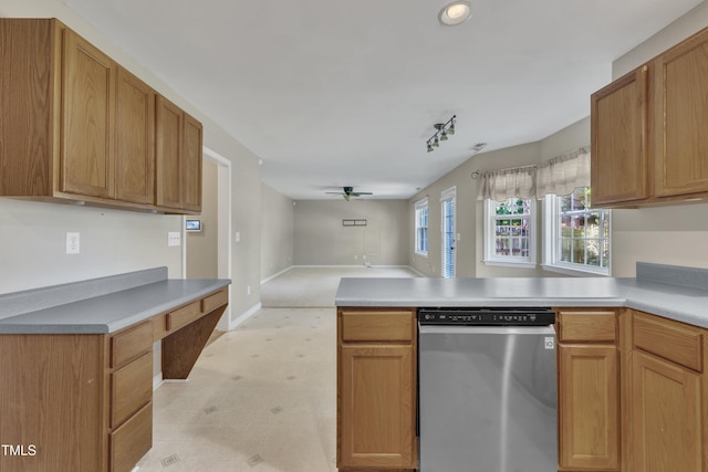 kitchen with dishwasher, a peninsula, ceiling fan, open floor plan, and light countertops