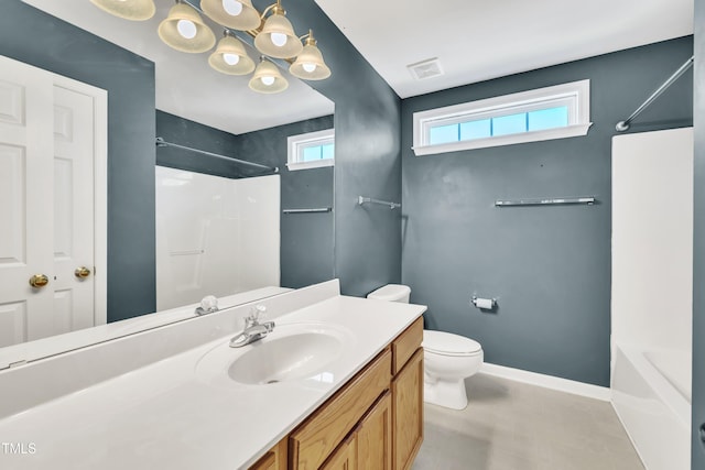 full bath featuring toilet, vanity, and baseboards