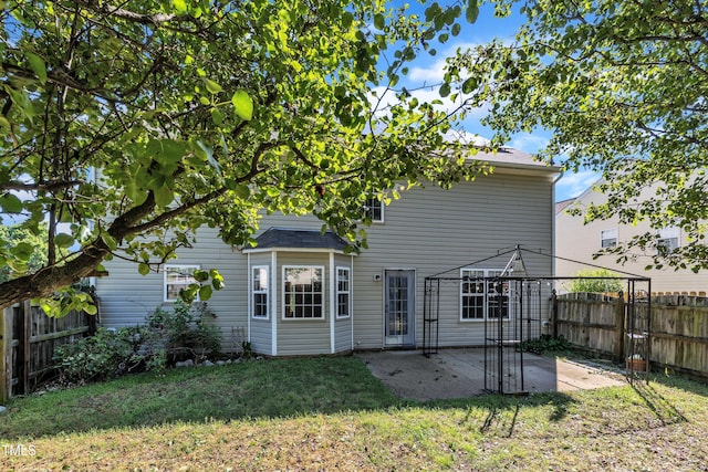 rear view of property with a patio