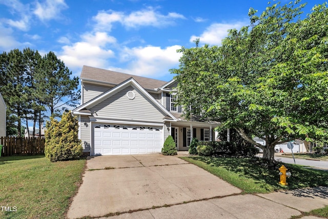traditional home featuring driveway and an attached garage