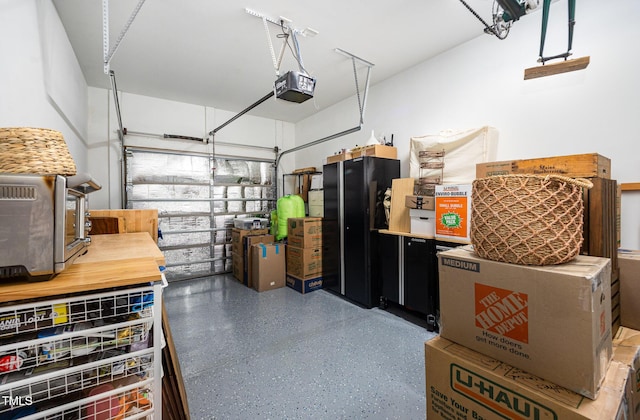 garage featuring a garage door opener