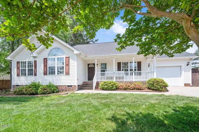 ranch-style home with crawl space, covered porch, an attached garage, and driveway