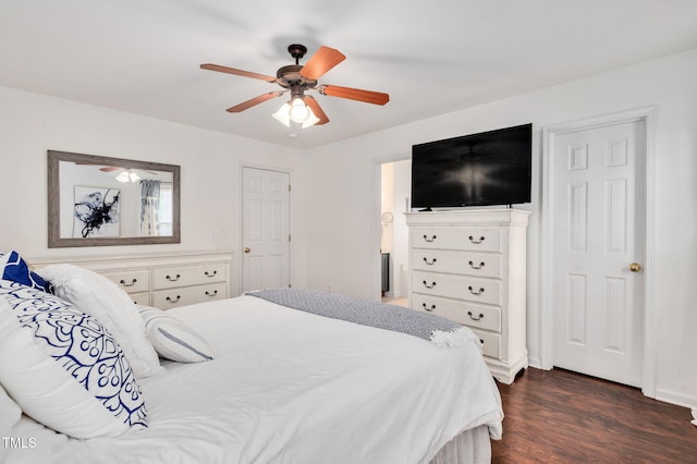 bedroom with dark wood finished floors and a ceiling fan