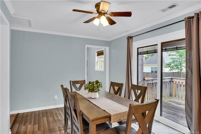 635 Chuckar Ct, Vass, NC 28394 - dining area featuring attic access, baseboards, ceiling fan, visible vents, and dark wood-type flooring