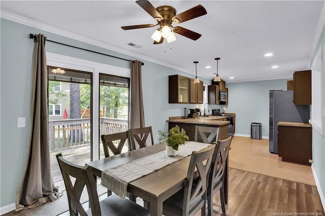 635 Chuckar Ct, Vass, NC 28394 - dining area with recessed lighting, ornamental molding, ceiling fan, visible vents, and light wood-style floors