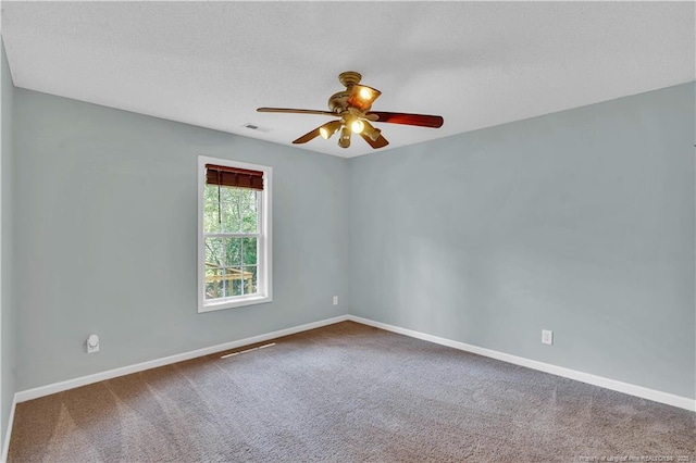 635 Chuckar Ct, Vass, NC 28394 - carpeted spare room featuring baseboards, visible vents, ceiling fan, and a textured ceiling