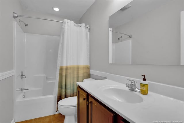 635 Chuckar Ct, Vass, NC 28394 - full bathroom featuring toilet, tile patterned floors, vanity, and shower / bath combo with shower curtain