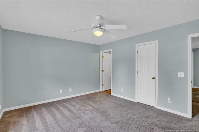 635 Chuckar Ct, Vass, NC 28394 - unfurnished bedroom with a textured ceiling, baseboards, ceiling fan, and carpet floors
