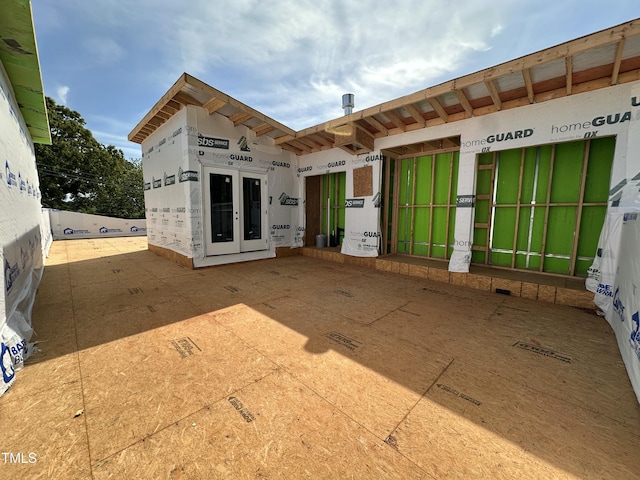back of house with french doors