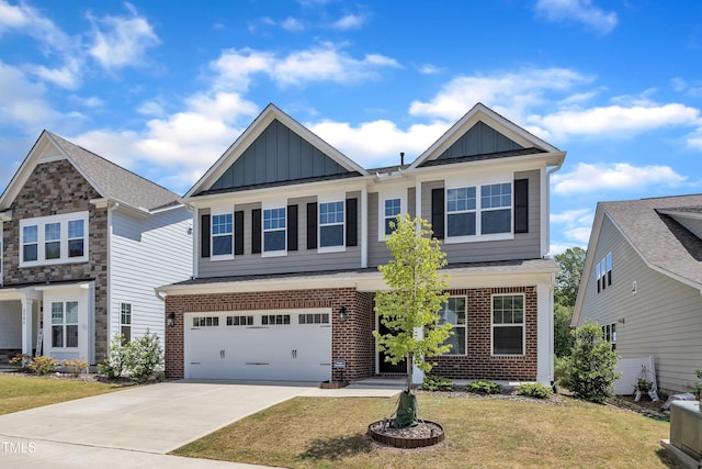 2100 Curry Meadow Way, Durham, NC 27703 - craftsman-style house featuring board and batten siding, brick siding, driveway, a garage, and a front lawn