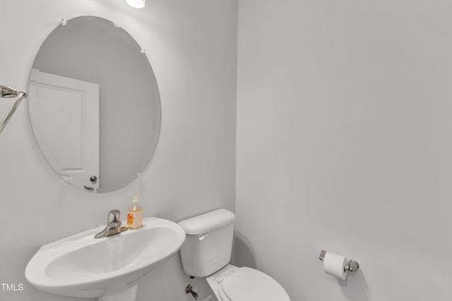2100 Curry Meadow Way, Durham, NC 27703 - bathroom with a sink and toilet