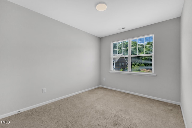 2100 Curry Meadow Way, Durham, NC 27703 - empty room featuring carpet flooring and baseboards