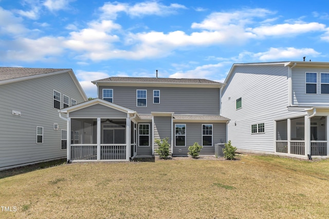 2100 Curry Meadow Way, Durham, NC 27703 - rear view of property with a sunroom, a lawn, and ceiling fan