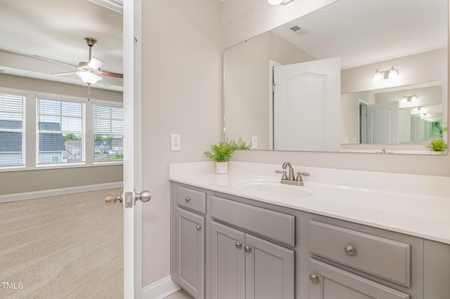 159 Gladstone St, Raeford, NC 28376 - bathroom with ceiling fan, baseboards, and vanity