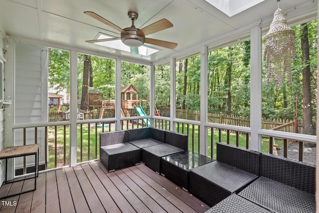 sunroom / solarium with a ceiling fan, an outdoor hangout area, and healthy amount of natural light
