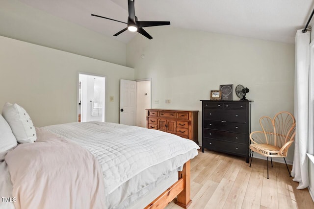 bedroom featuring light wood-style flooring, high vaulted ceiling, and a ceiling fan