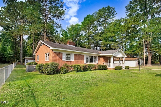 320 Dead End Rd, Enfield, NC 27823 - single story home with a chimney, brick siding, covered porch, and a fenced backyard