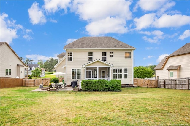 rear view of house with a patio, a sunroom, a gate, and crawl space
