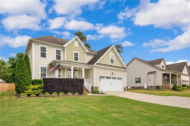 view of front of house with covered porch, driveway, and an attached garage