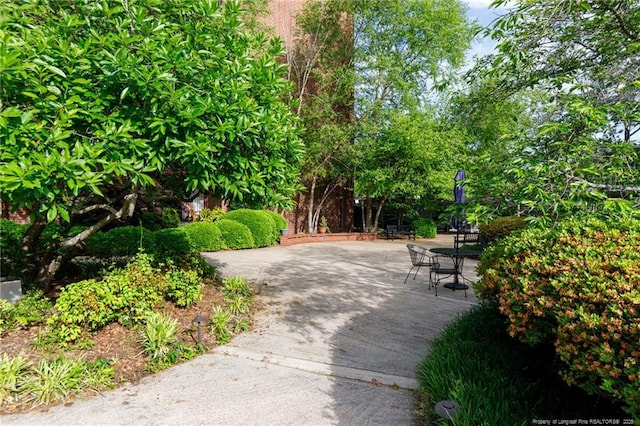 view of home's community featuring a patio area